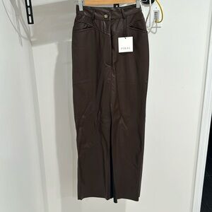 Faux leather maxi skirt with slit in the front.